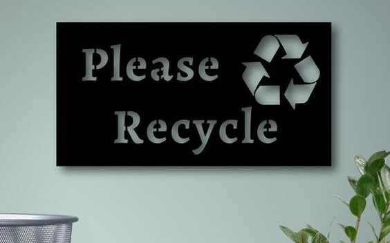 Cartel que dice "por favor recicla"